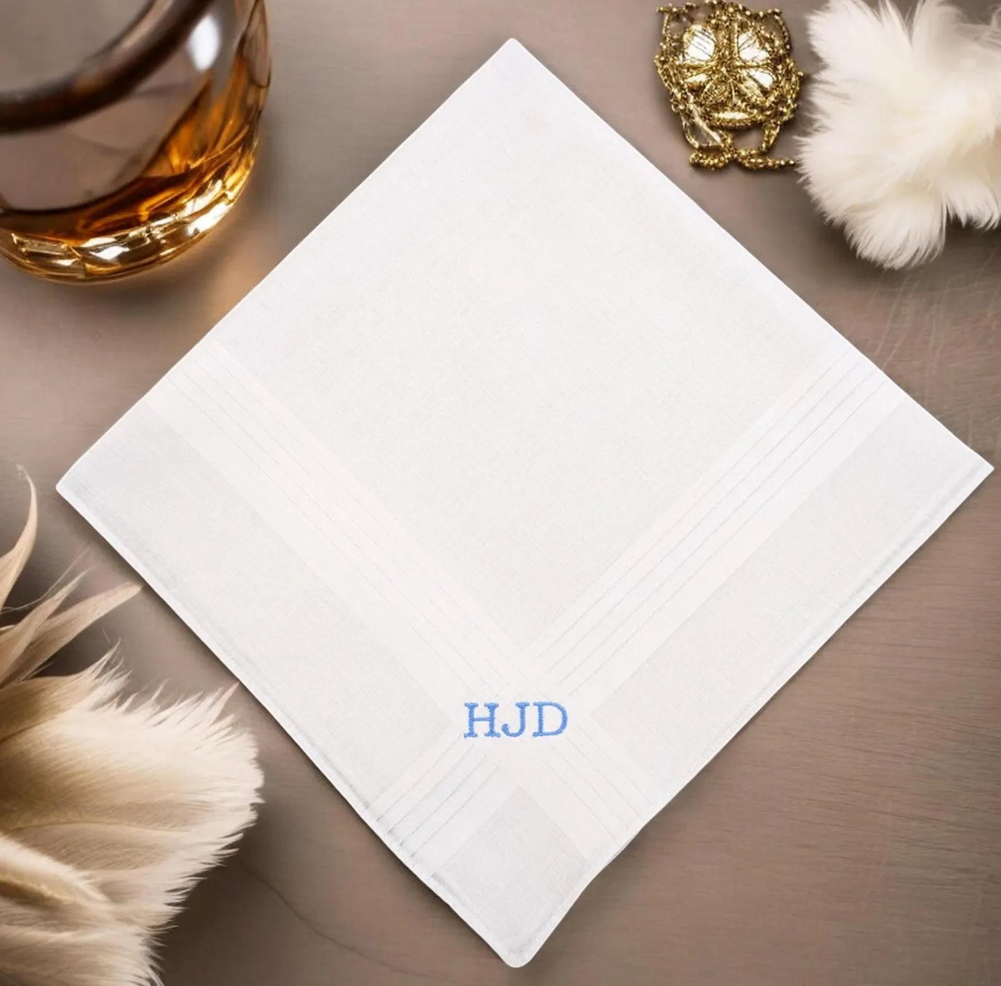 White handkerchief with embroidered initials